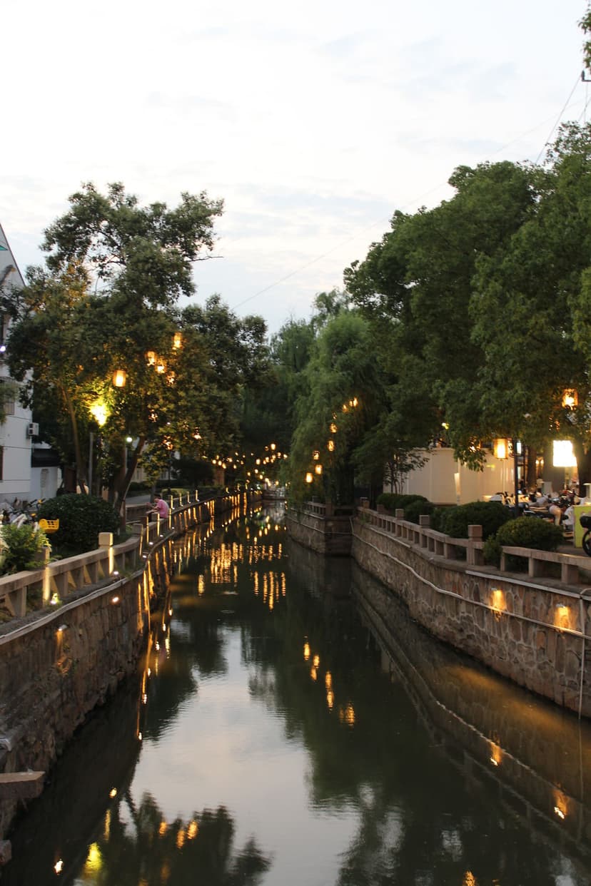 Chinese canal at night with lanterns
